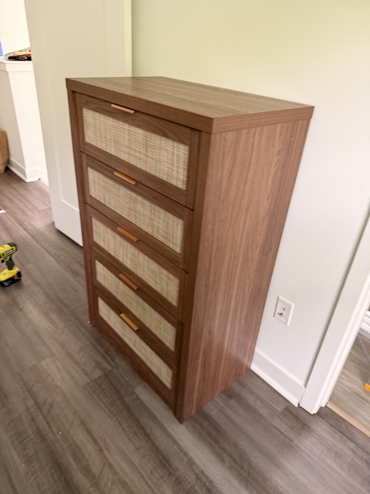 Tall wooden dresser with five drawers assembled